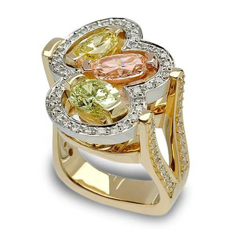 Interlude Mint Tsavorite Garnet and Diamond Fashion Ring featuring 2.04ct Mint Tsavorite Garnet, accented with Round Brilliant Cut Diamonds and Tourmaline, set in 18k Yellow Gold and Platinum.