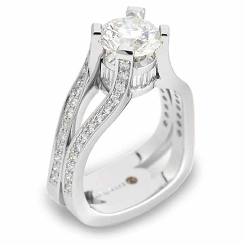 Evolve 4 Carat Round Brilliant Cut Diamond Platinum Engagement Ring featuring a central diamond and accent diamonds on a sleek platinum band.