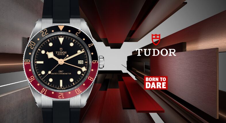 Tudor-banner-model-page-mobile TUDOR GMT Master Chronometer watch with black dial, red and blue bezel, featuring the TUDOR logo and "BORN TO DARE" tagline against a modern abstract background.