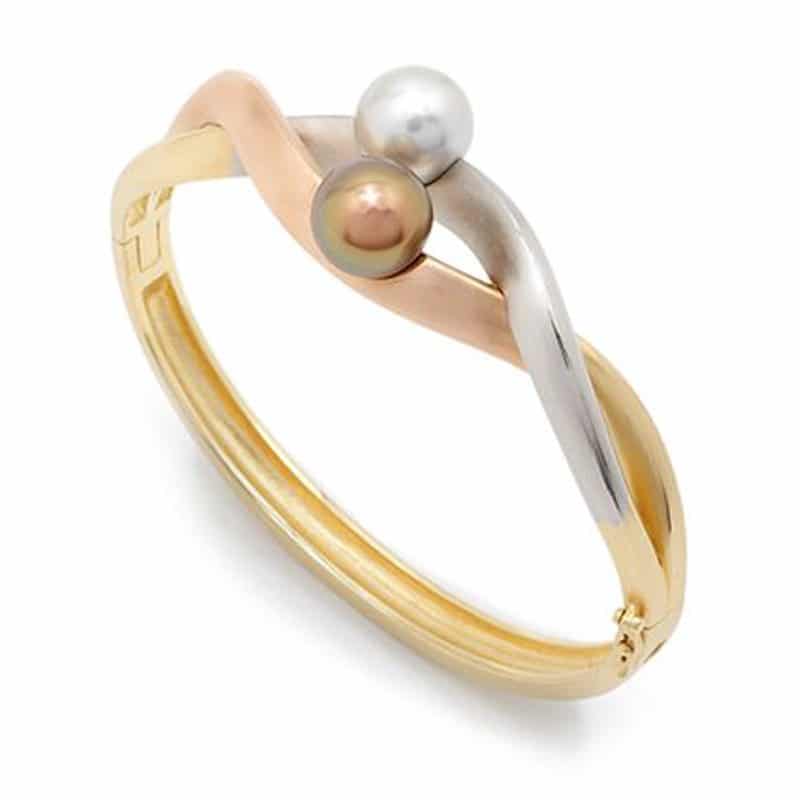 Fusion Tahitian Pearl Gold and Palladium Bracelet Fusion Tahitian pearl bracelet featuring gold and palladium accents, showcasing a modern design with interwoven textures.