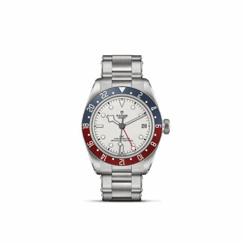 TUDOR Black Bay GMT watch featuring a polished and satin-finished steel case, white domed opaline dial, and bidirectional rotatable bezel with burgundy and blue accents, presented on a riveted steel bracelet.
