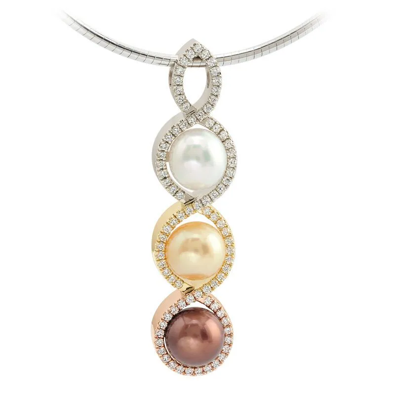 Emerald cut tourmaline pendant with three multi-colored pearls surrounded by diamonds, showcasing the craftsmanship and luxury of Coffin & Trout Fine Jewelers.