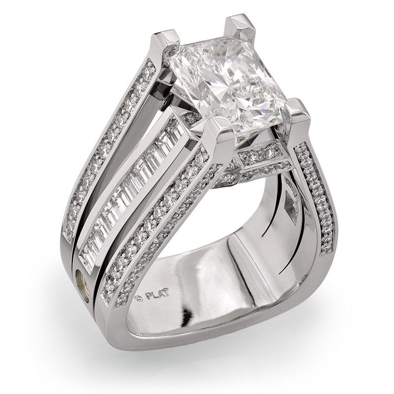 Interlace radiant cut diamond engagement ring in platinum with intricate band design and accent diamonds.