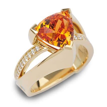 Revolution Trillion Cut Garnet and Diamond Yellow Gold Ring