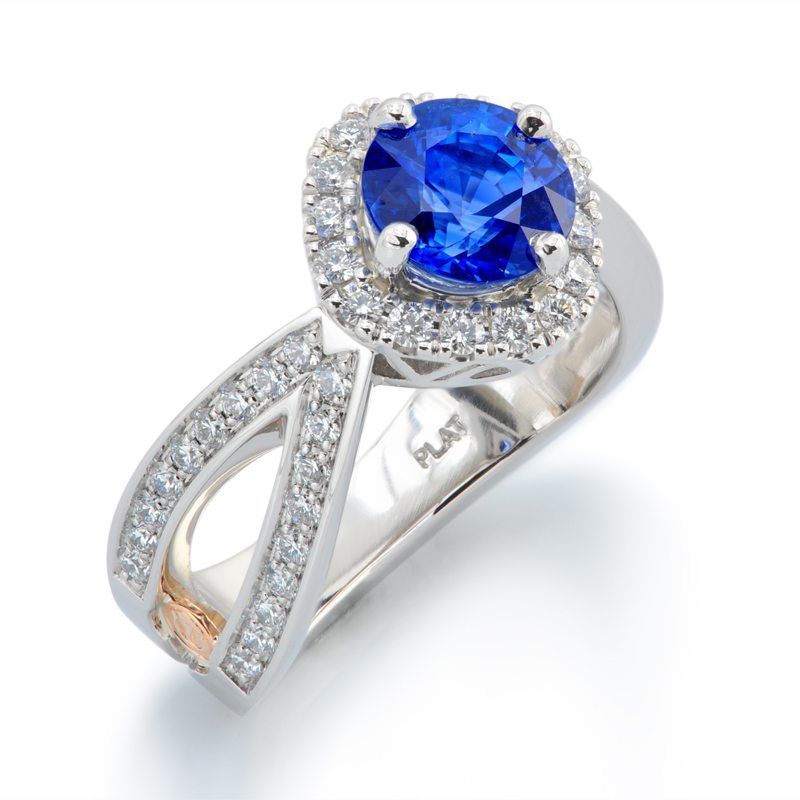 flora blue sapphire and diamond halo platinum ring, source