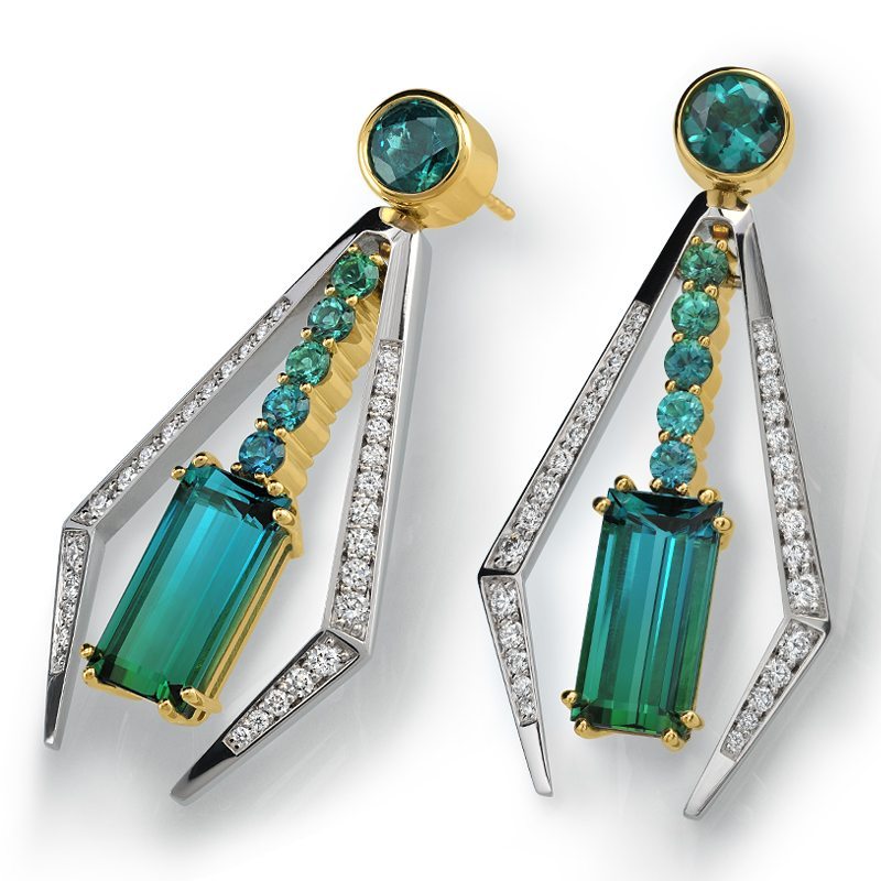 Special Occasion Earrings Luxurious designer earrings featuring emerald-cut teal gemstones and sparkling diamonds, showcasing elegance and craftsmanship for special occasions.